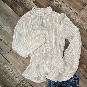 Women’s white semi sheer blouse. Size M. Long sleeves.Like New.